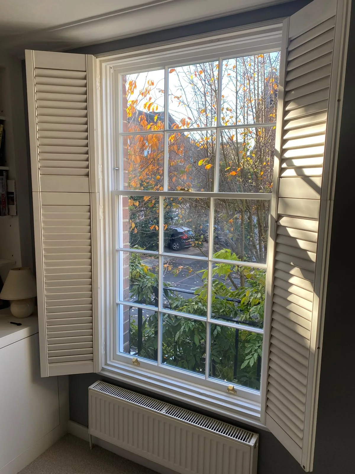 Plantation shutters completed by Stile