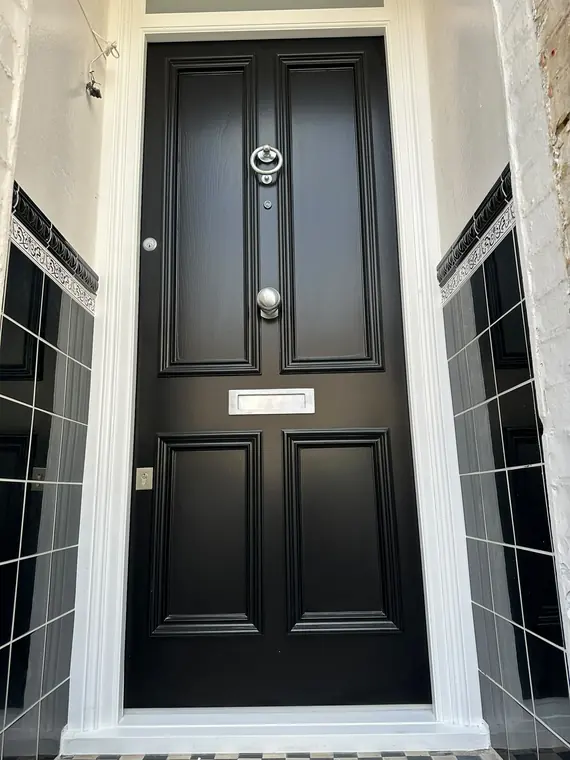 Bespoke black panelled front door