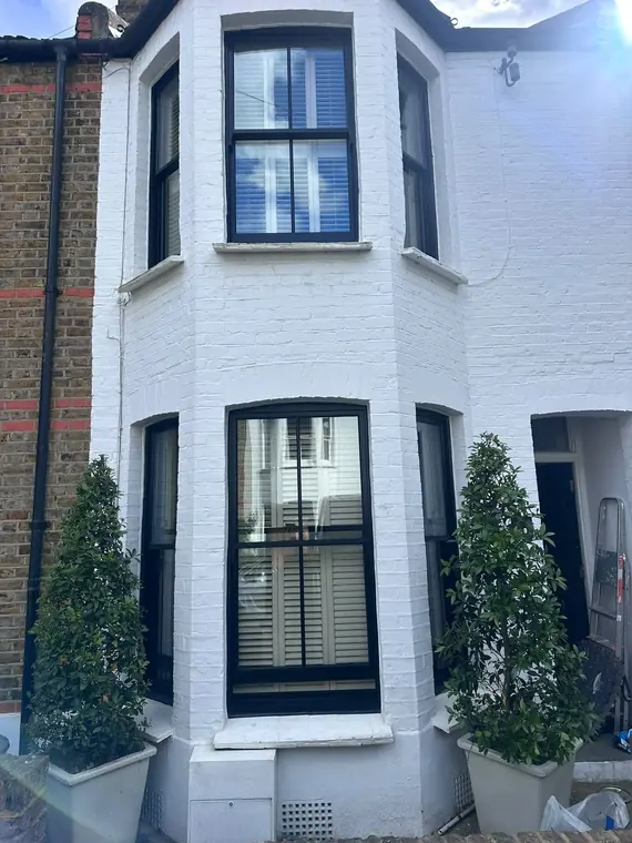 Coordinated facade and black sash restoration