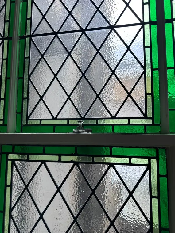 Close detail of green leaded stained glass