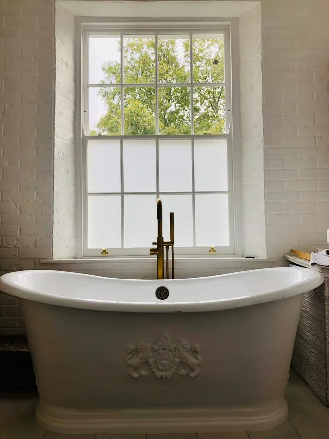 Privacy-glazed bathroom sash