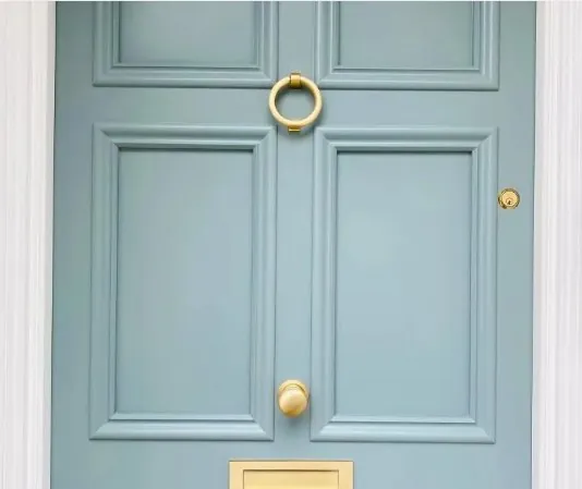 Sage green panelled front door