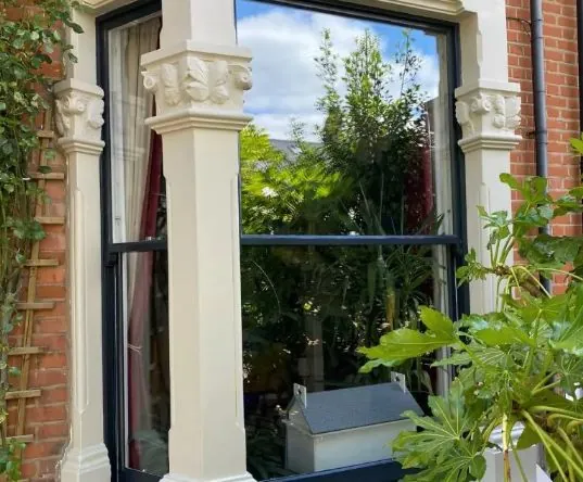 Dark-painted replacement sash