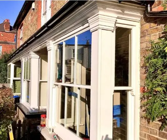 Restored timber bay windows